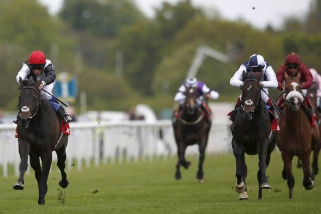 Golden Horn storms clear of his stablemate Jack Hobbs, second right, to win the Dante Stakes. Picture: Getty