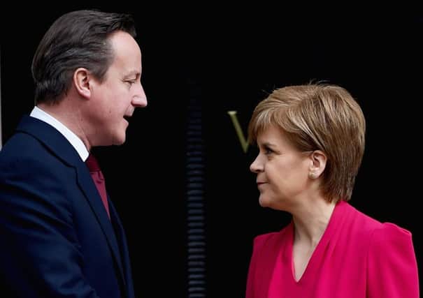 Cameron yesterday told the SNP to 'take action and stop talking'. Picture: Getty
