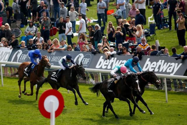 SnowSky, with Ryan Moore on board, gets the better of Brown Panther. Picture: Getty