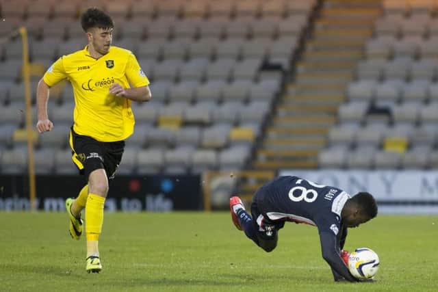 Livingston's Declan Gallagher (pictured in yellow shirt) . Picture: SNS
