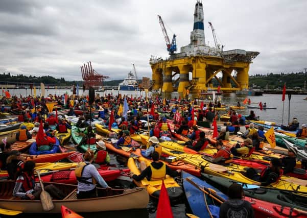 The protest flotilla in the Port of Seattle near to Shells Polar Pioneer rig, which is due to start drilling this summer. Picture: AP