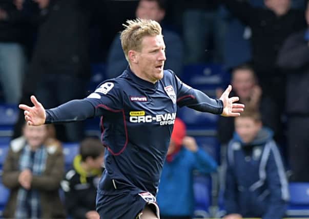 Michael Gardyne celebrates after netting the equaliser for County. Picture: SNS