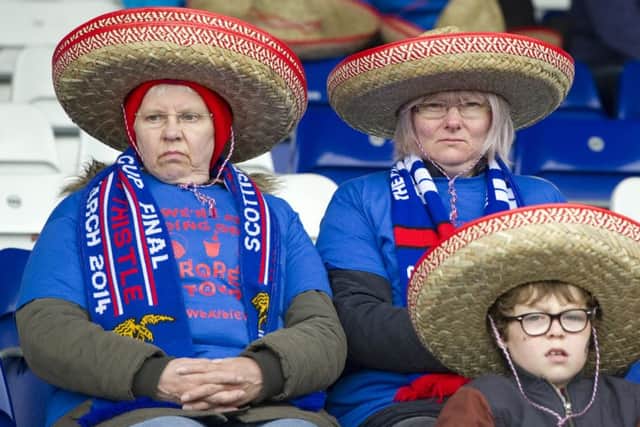 A trio of Inverness fans eagerly anticipate European football. Picture: SNS