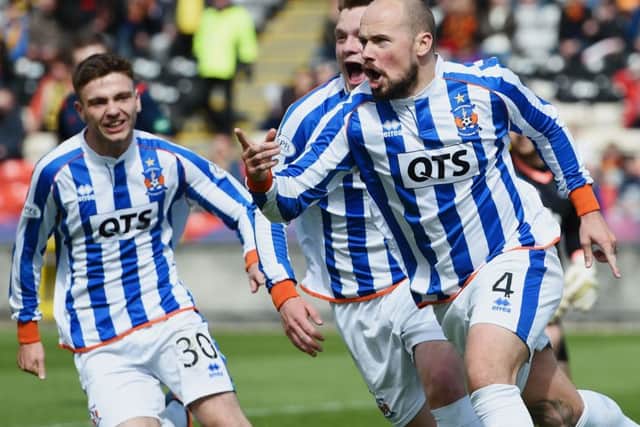 Jamie Hamill wheels away after getting the ball rolling in Kilmarnock's vital win. Picture: SNS