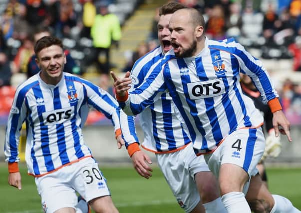 Jamie Hamill wheels away after getting the ball rolling in Kilmarnock's vital win. Picture: SNS