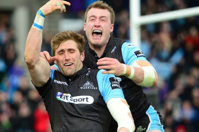Richie Vernon (left) celebrates his try with team-mate Stuart Hogg. Picture: SNS