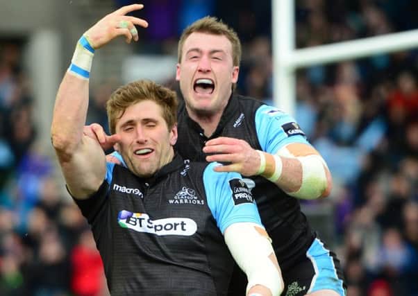 Richie Vernon (left) celebrates his try with team-mate Stuart Hogg. Picture: SNS