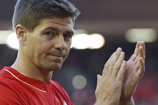 Steven Gerrard acknowledges the crowd after playing the final home game of his 17-year Liverpool career. Picture: AP
