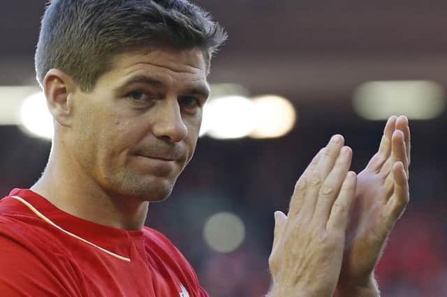 Steven Gerrard acknowledges the crowd after playing the final home game of his 17-year Liverpool career. Picture: AP