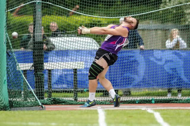 Mark Dry unleashes the throw that set a new Scottish hammer record, 79.93 metres, and also earned qualifying standard for the World Championships. Picture: Bobby Gavin