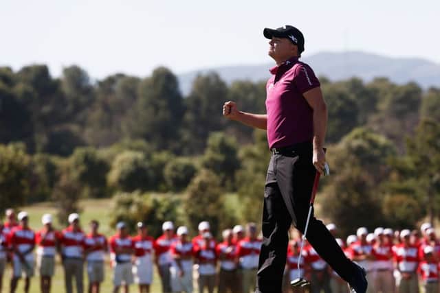 James Morrison pumps his fist after winning the Spanish Open  his second European Tour title  after a closing 69. Picture: Getty