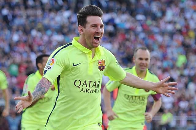 Lionel Messi celebrates after scoring Barcelona's opening goal. Picture: Getty
