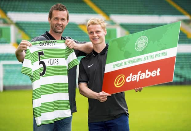 Gary Mackay-Steven with Ronny Deila at the launch of the clubs new deal with Dafabet. Picture: SNS