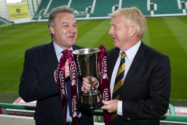 Qatar Airways UK and Ireland manager Richard Oliver and Gordon Strachan with the Qatar Airways Cup. Picture: SNS