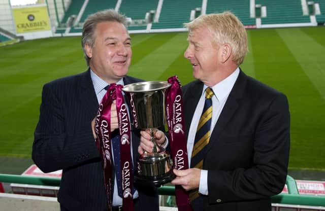 Qatar Airways UK and Ireland manager Richard Oliver and Gordon Strachan with the Qatar Airways Cup. Picture: SNS
