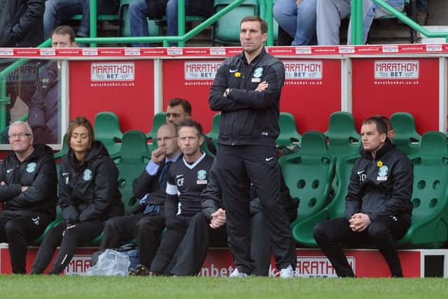 Hibs boss Alan Stubbs is calmness personified as he surveys the match against Rangers at Easter Road in March. Picture: Neil Hanna