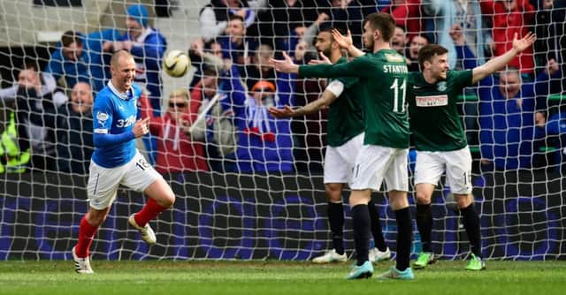 Rangers forward Kenny Miller celebrates scoring during the 2-0 Championship win over Hibs in March. Picture: Getty