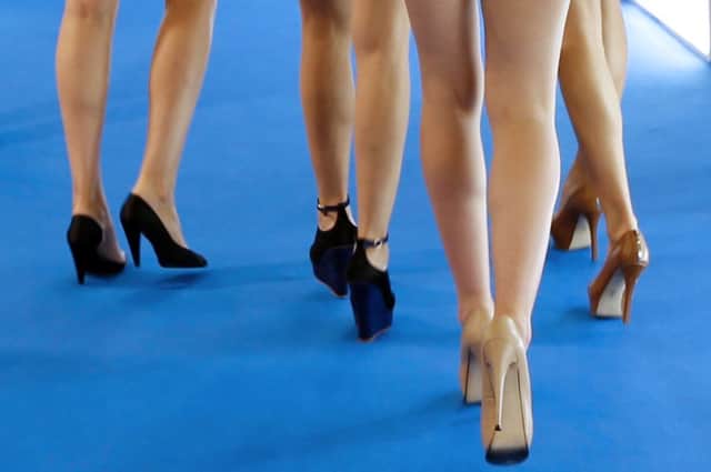 Glitz and glamour mark out the red carpet at Cannes, but if youre female and youre wearing flat shoes, you might be excluded despite claims by the organisers that no such ban exists. Picture: Getty