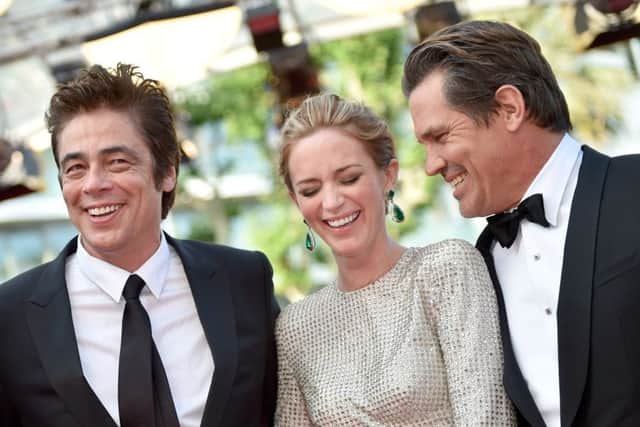 Benicio del Toro and Josh Brolin, pictured with Emily Blunt, may wear heels in protest at Cannes' sartorial rule. Picture: Getty