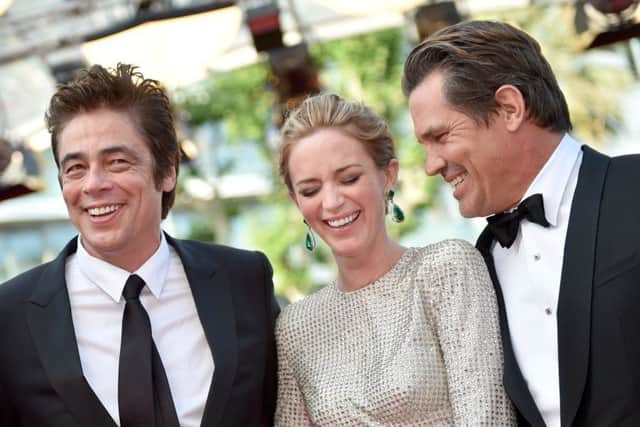 Benicio del Toro and Josh Brolin, pictured with Emily Blunt, may wear heels in protest at Cannes' sartorial rule. Picture: Getty