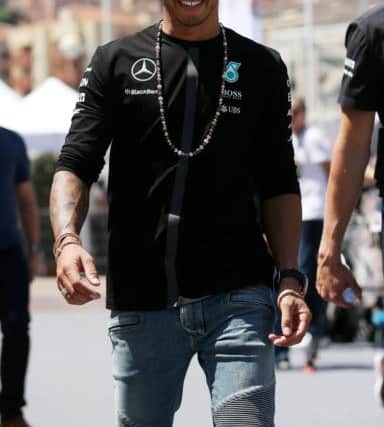 Lewis Hamilton, who has signed a new deal with Mercedes, arrives in the paddock to prepare for the Monaco Grand Prix. Picture: Getty