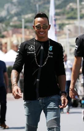 Lewis Hamilton, who has signed a new deal with Mercedes, arrives in the paddock to prepare for the Monaco Grand Prix. Picture: Getty