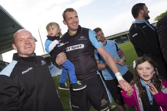 Al Kellock, who was honoured this week at the Pro12 awards, celebrates Glasgows win over Ulster with Gregor Townsend. Picture: SNS/SRU