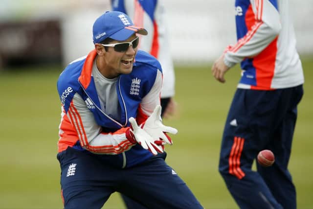 England captain Alastair Cook takes part in catching practice ahead of todays first Test against New Zealand at Lords. Picture: Paul Harding/PA