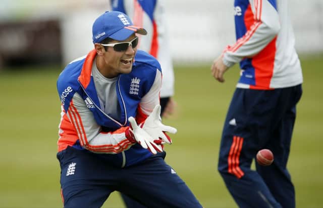 England captain Alastair Cook takes part in catching practice ahead of todays first Test against New Zealand at Lords. Picture: Paul Harding/PA
