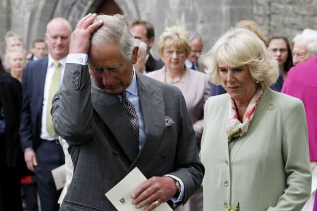 Prince Charles and the Duchess of Cornwall attend a tree planting ceremony after a service of peace and reconciliation at St. Columba's Church in Drumcliffe, Ireland. Picture: AFP/Getty Images
