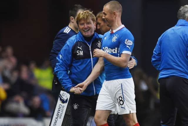 Rangers manager Stuart McCall, left, congratulates goalscorer Kenny Miller on his performance. Picture: SNS