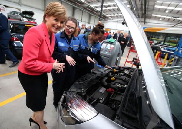 Nicola Sturgeon marked the start of Modern Apprenticeship week with a visit to the Arnold Clark training centre in Glasgow. Picture: PA