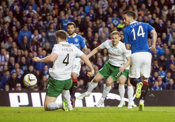 Rangers' Nicky Clark (right) opens the scoring. Picture: PA