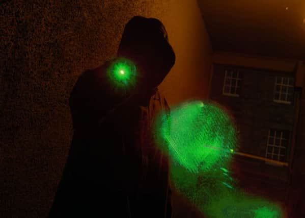 A green laser pen was shone at the helicopter pilot. Picture: TSPL