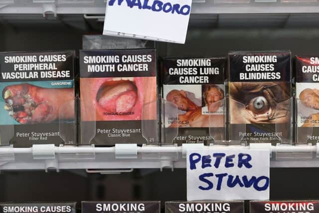 Cigarettes in Australia bear dire health warnings and no logos. Picture: Getty