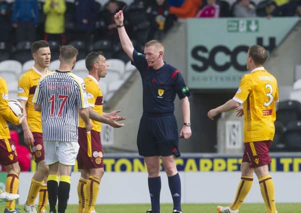 A red card shown to Scott McDonald last week has been downgraded to a yellow. Picture: SNS