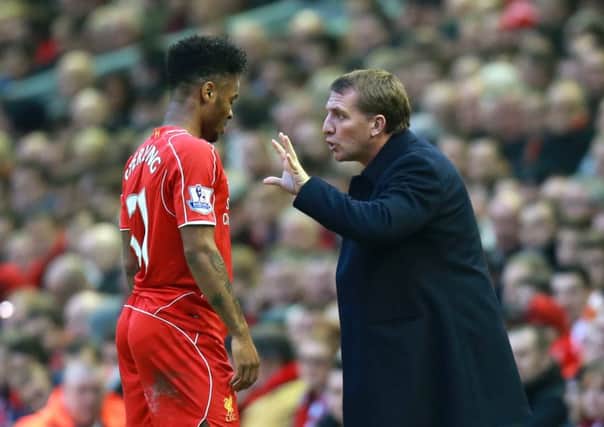 Raheem Sterling, left, was due to meet Liverpool boss Brendan Rodgers to discuss his future after rejecting a new deal in January Picture: PA