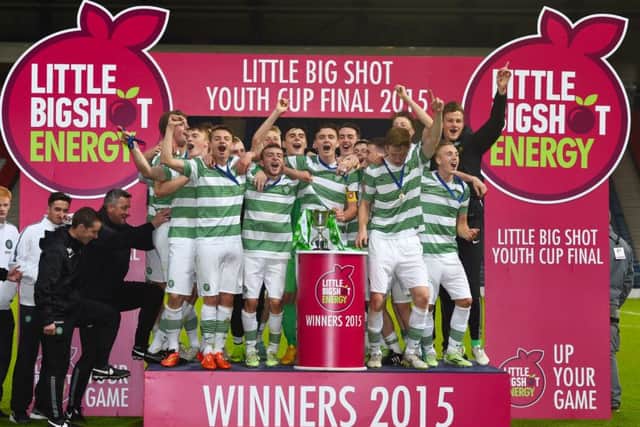 The Celtic players celebrate as they are crowned champions of the Little Big Shot Scottish Youth Cup. Picture: SNS