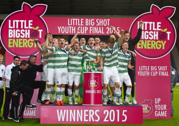 The Celtic players celebrate as they are crowned champions of the Little Big Shot Scottish Youth Cup. Picture: SNS