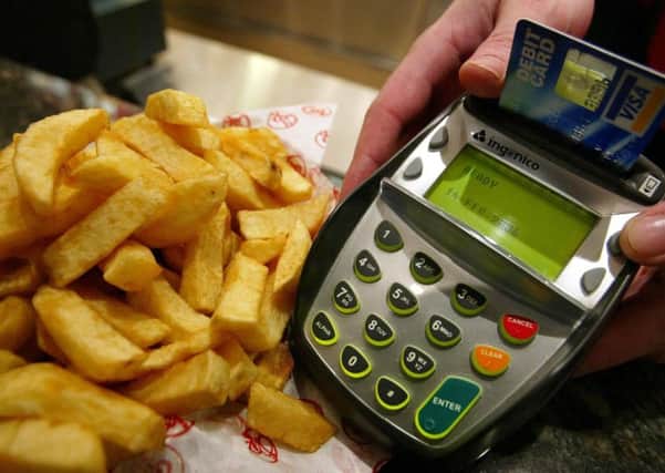 Card payment is becoming easier for small items. Picture: PA