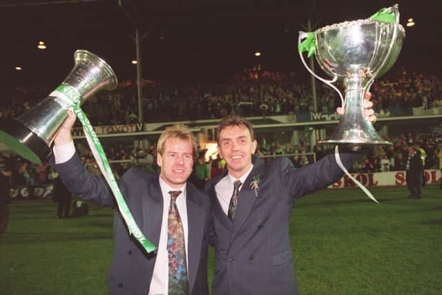 Celebrating Hibs Skol Cup success with skipper Murdo MacLeod in 1991.