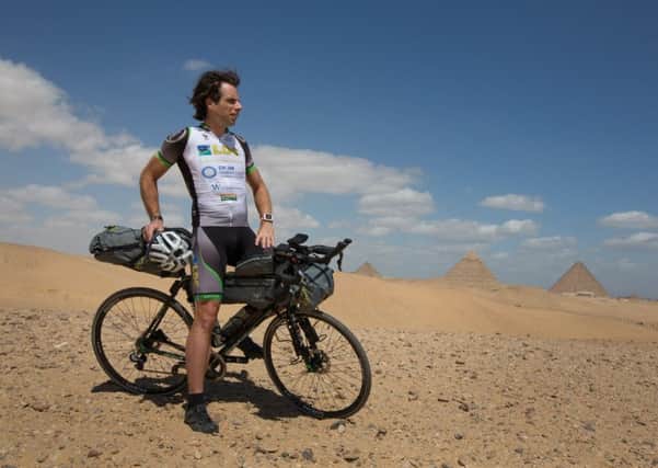 Scottish adventurer Mark Beaumon, who has completed a rare hat-trick by becoming the fastest rider to cycle the 6,750-mile length of Africa. Picture: Jeremy Sutton-Hibbert/PA
