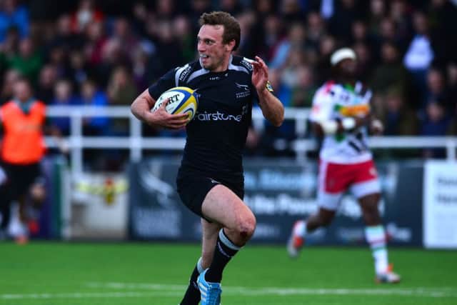 Mike Blair played his final match for Newcastle last Saturday and celebrated by scoring a try. Picture: Getty