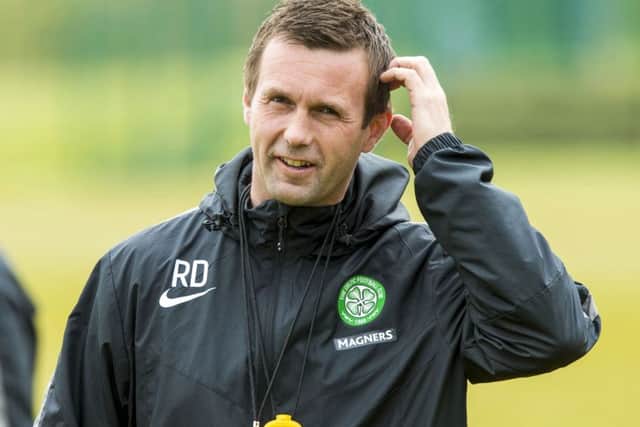 Celtic manager Ronny Deila is all smiles at training. Picture: SNS