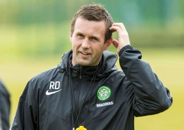 Celtic manager Ronny Deila is all smiles at training. Picture: SNS