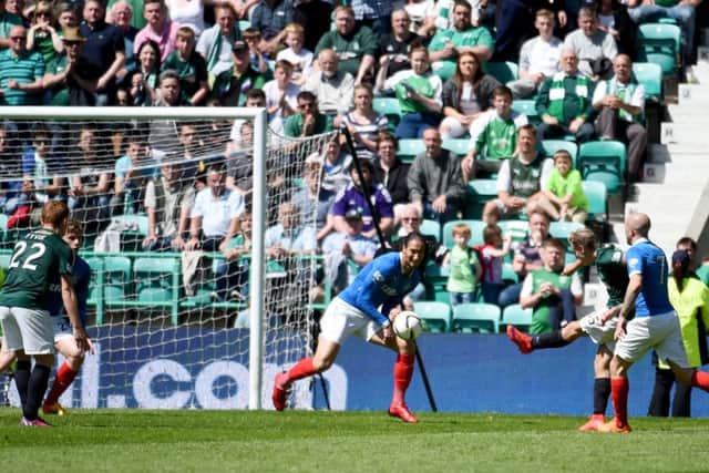 Hibernian's Jason Cummings (2nd right) puts his side ahead late on. Picture: SNS