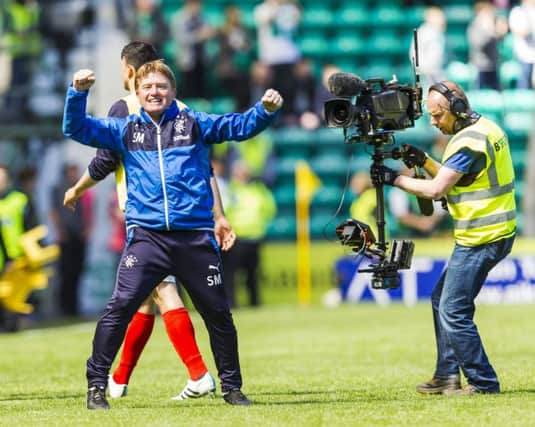 Rangers manager Stuart McCall reacts with joy as his side clinch their place in the play-off final. Picture: SNS