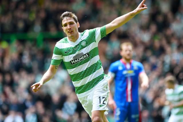 Stefan Scepovic wheels away after scoring his second and Celtic's third of the afternoon. Picture: SNS