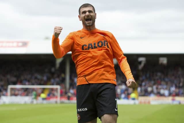 Nadir Ciftci celebrates after putting his side 1-0 up in the recent Dundee derby. Picture: SNS