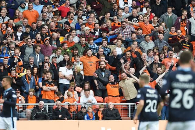 Dundee United fans roar on their team. Picture: SNS